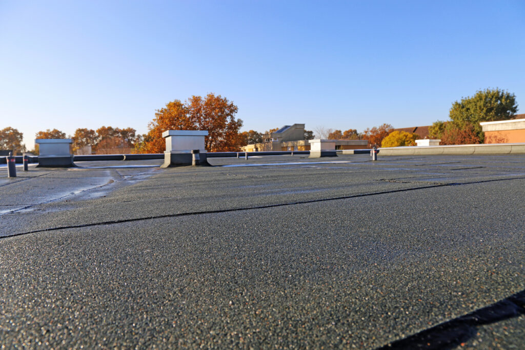 Types of Commercial Flat Roof Repair Options - ACR
