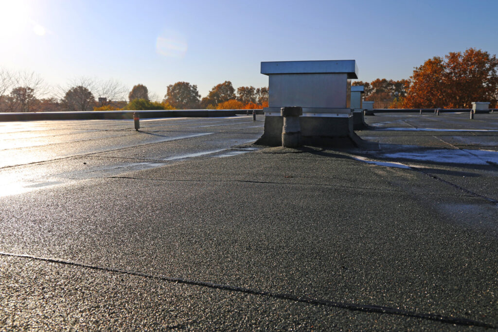 Hot Mop Roof: Why Consider It For Your Commercial Property - All Climate Roofing