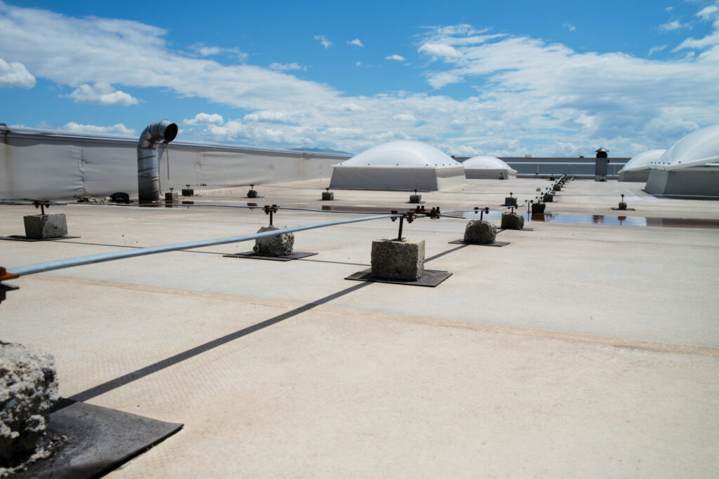 Signs Your Property Needs a Commercial Roof Replacement - All Climate Roofing