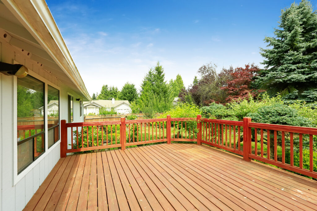 Deck Sealant vs. Stain: Which One Is Right for Your Wood Deck? - All Climate Roofing